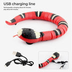 Toy snake with USB charging cable on a white background