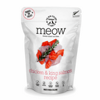 Package of meow freeze-dried cat bites with chicken and king salmon recipe on a white background