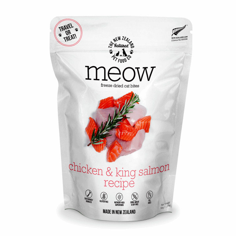 Package of meow freeze-dried cat bites with chicken and king salmon recipe on a white background