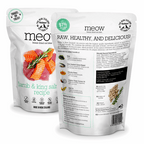 Two packages of 'meow' raw pet food with text and images on a white background